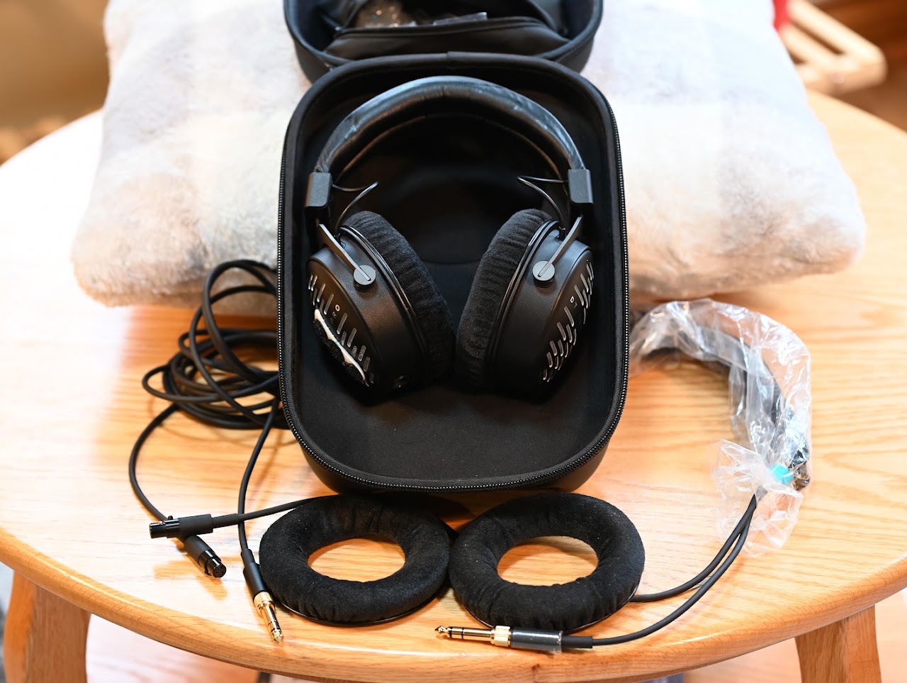 DT 1990 Pro headphones and accessories arranged in an open carrying case