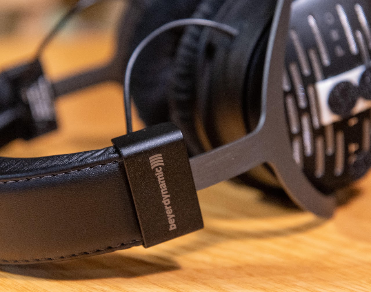 Close view of the Beyerdynamic badge on the DT 1990 Pro headband