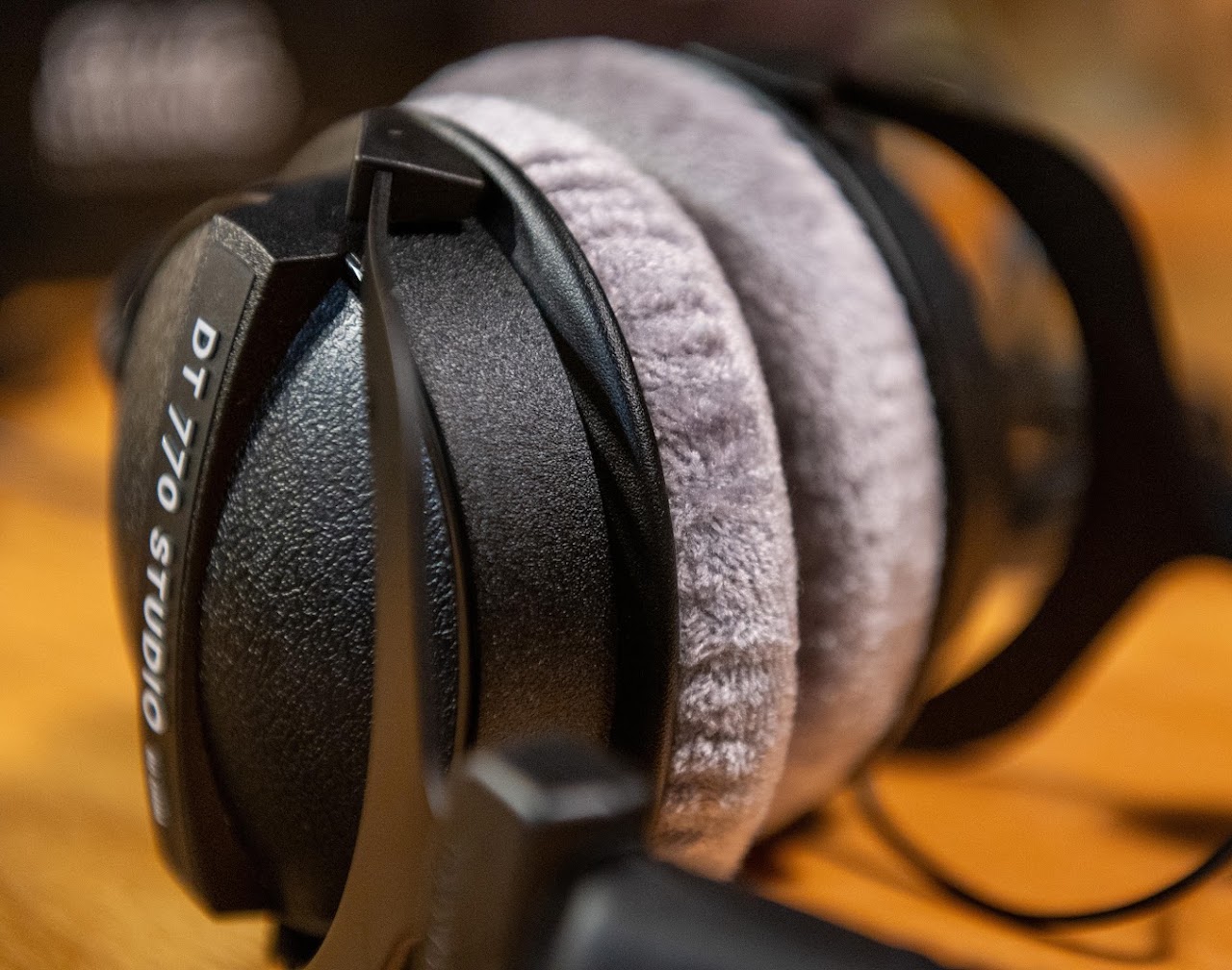 Side view of Beyerdynamic DT 770 headphones with silver velour ear pads
