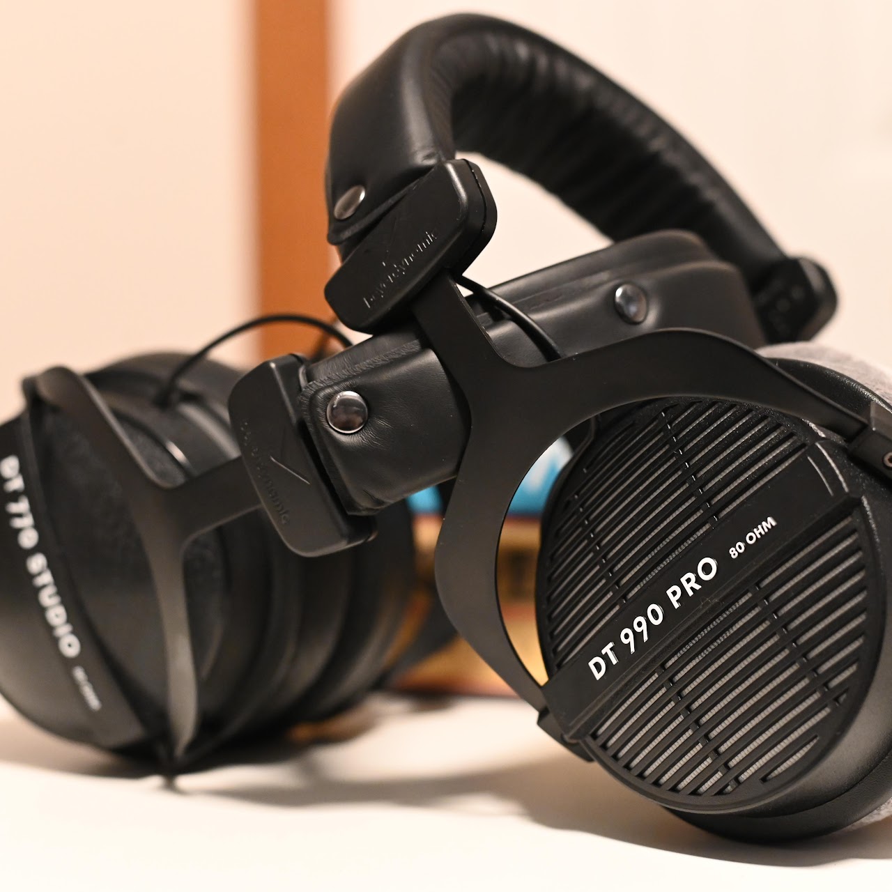 Beyerdynamic DT 990 Pro headphones arranged with another pair