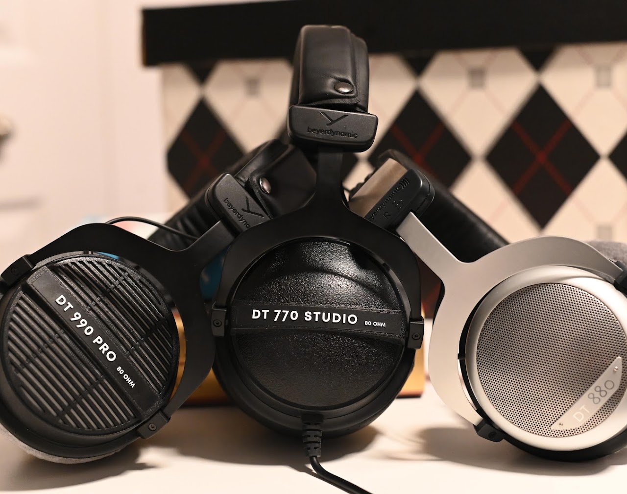 Three Beyerdynamic DT-series headphones arranged together