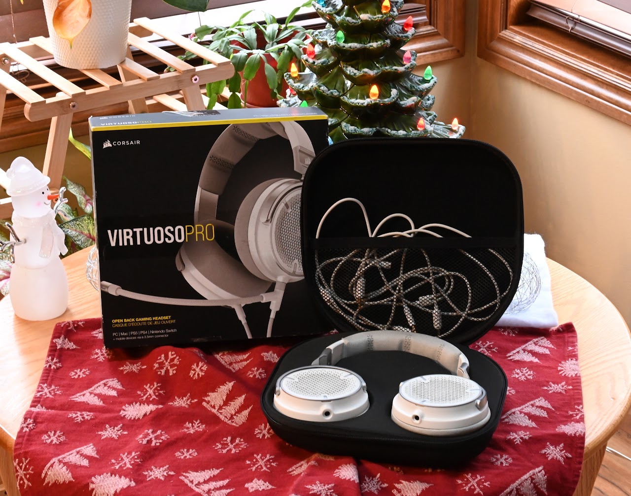 Corsair Virtuoso Pro headset with cables, case, and packaging