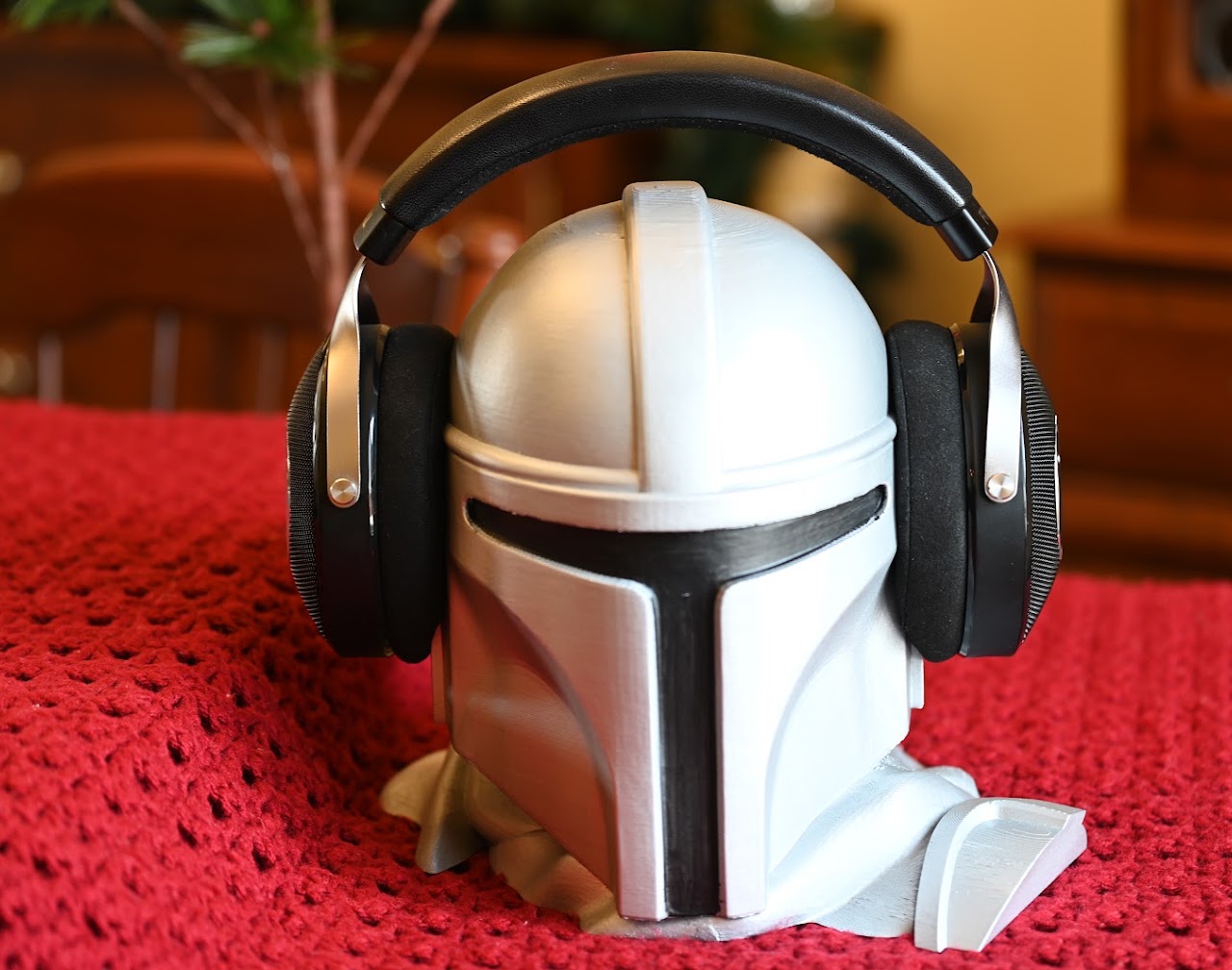 Front view of Focal Elear headphones on a helmet display