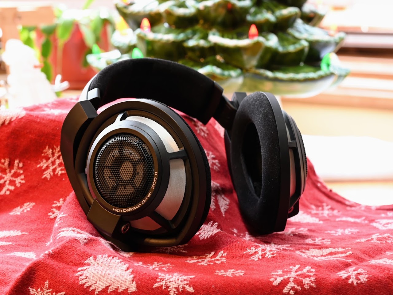 Sennheiser HD 800 S headphones on a red patterned cloth
